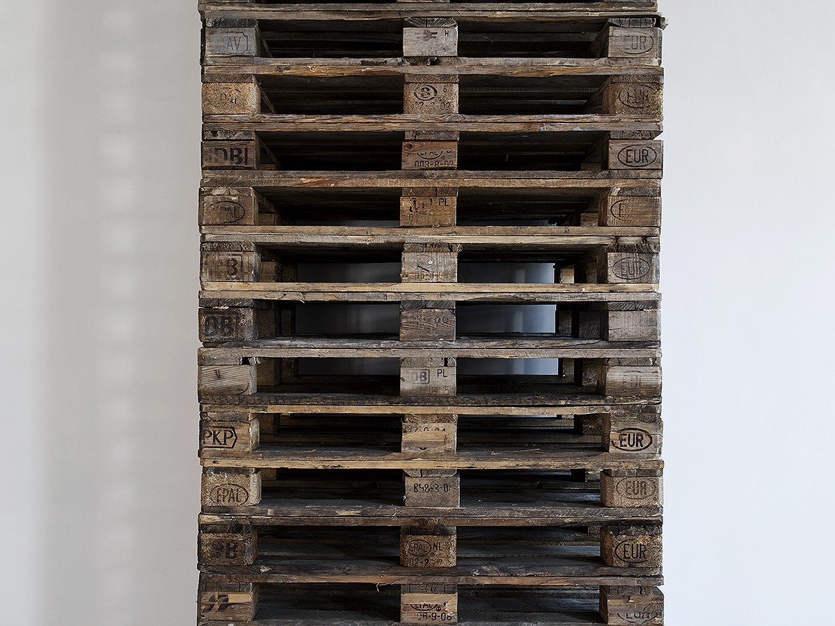 'Monolith', 2011. Stacked wooden pallets